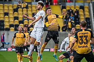 Meier schraubt sich im Kopfballduell mit Bozic nach oben. | Foto: Dennis Hetzschold