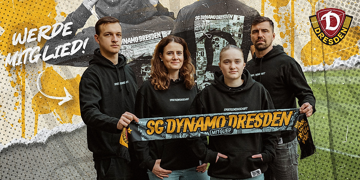 Mitglieder der SG Dynamo Dresden halten einen Mitgliederschal
