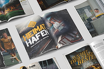 Eine Grafik mit aufgeschlagenen Zeitungen