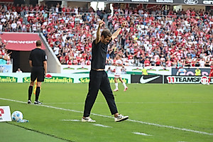 Schuster celebrates his maiden Bundesliga win. 