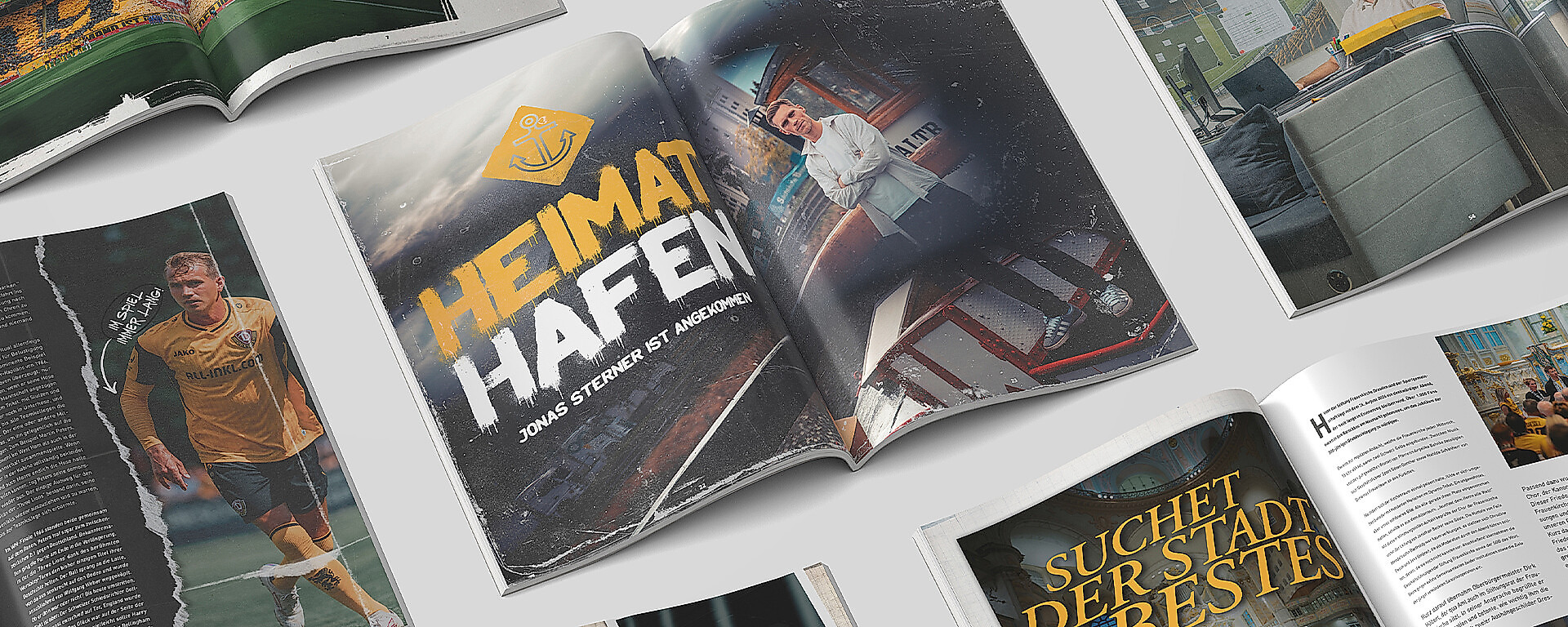 Eine Grafik mit aufgeschlagenen Zeitungen