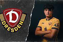 Filip Zahalka neben dem Dynamo-Wappen.